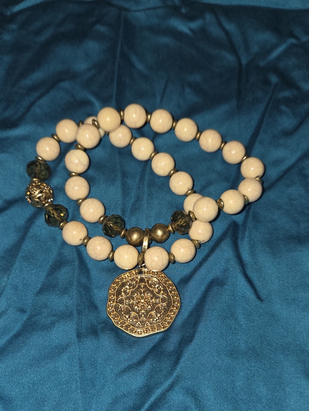 Beige Stone Beaded Bracelet with Gold Medallion Pendant